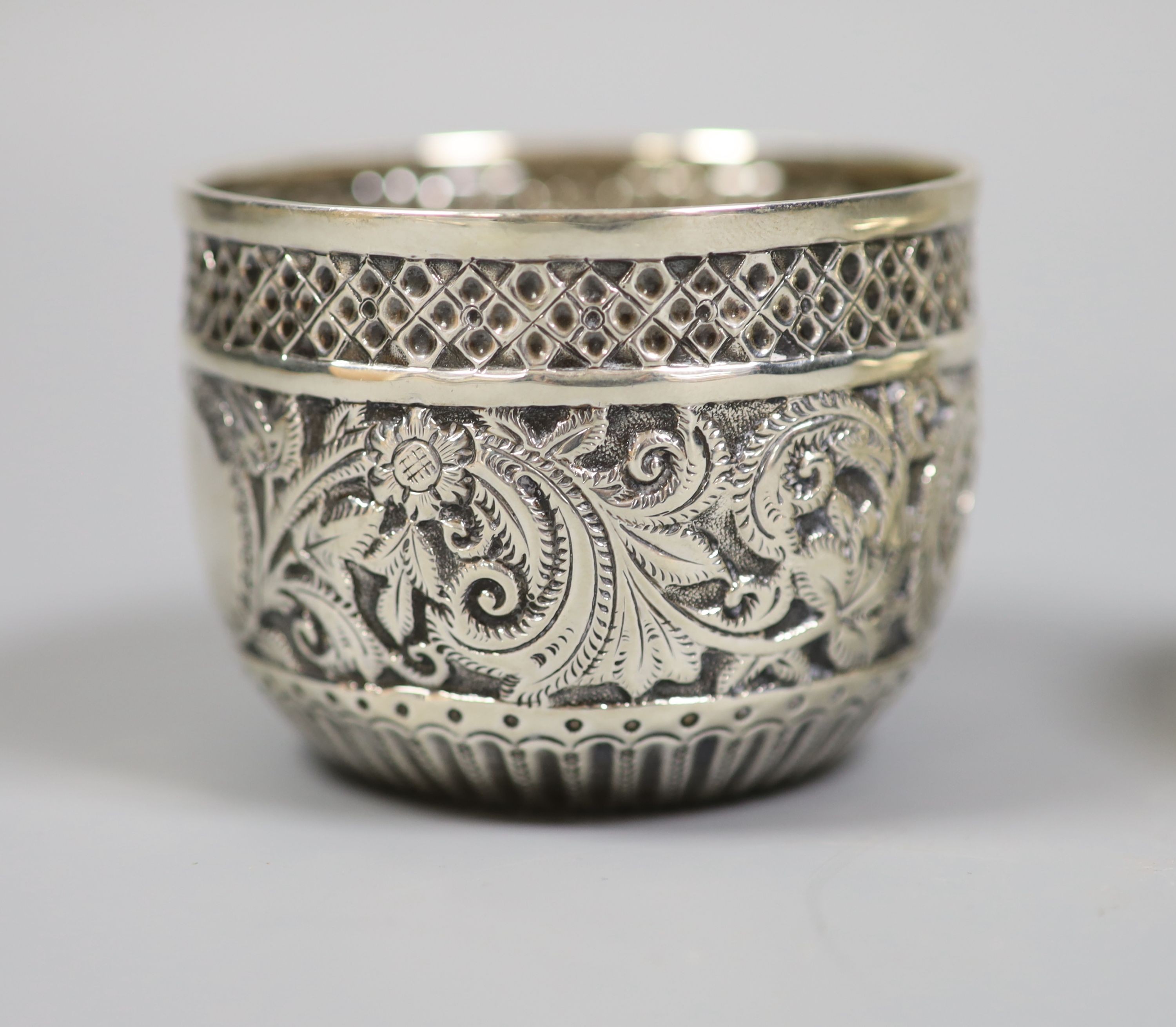 A late Victorian repousse silver bowl, London, 1898, diameter 8cm, a modern silver mounted circular trinket box, Birmingham, 1976 and a christening knife and fork, the knife with silver blade.